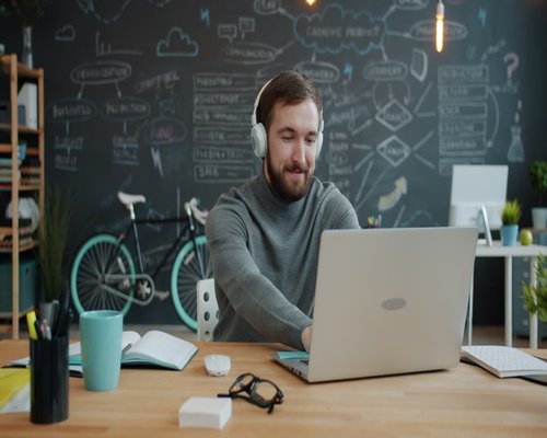 professional man working at modern office desk